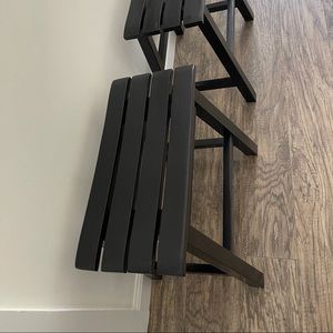 PAIR OF BLACK WOODEN STOOLS